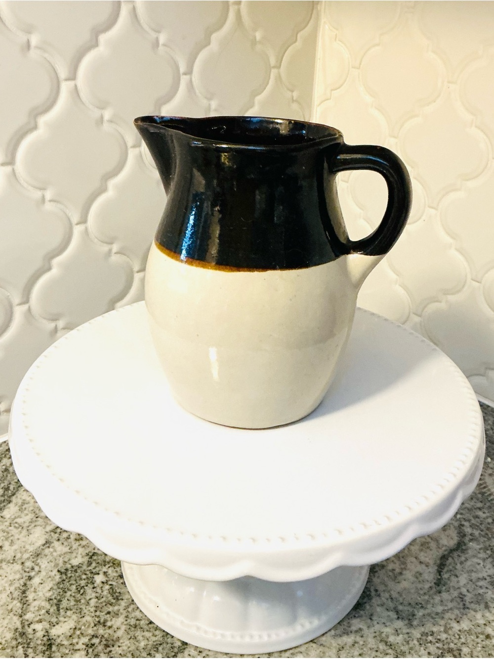 Roseville USA Black and Cream Pottery Pitcher
